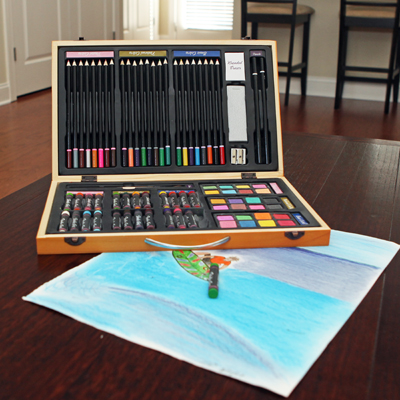 DARICE® 80-Piece Professional Art Set - Studio 71 deluxe art is perfect for young artists to start creating masterpieces! The set includes 24 color pencils, 24 oil pastels, 24 watercolor cakes, 2 paint brushes, 2 drawing pencils, pencil sharpener, kneaded eraser and sanding blocks. The materials come in a compact, portable wood case with handle. Small parts, not for children under 3 years.