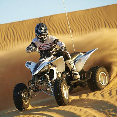 YAMAHA®  Wolverine YFZ450 - Tour the outdoors with all-day riding comfort on this sport ATV.  Lightweight, ultra compact steel frame combine with peak power output for great handling.  Features push-button electric starting, flip-type parking brake and calibrated suspension for high performance.