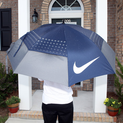 NIKE® Golf Umbrella - This Nike golf umbrella allows you to play like a pro, rain or shine! It features a 42” double canopy design and a push button auto-open for easy use!